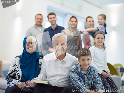 Image of portrait of happy modern muslim family