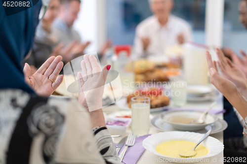 Image of modern muslim family having a Ramadan feast