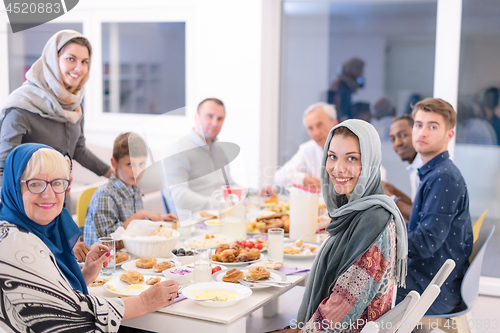 Image of modern multiethnic muslim family having a Ramadan feast