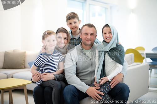 Image of portrait of young happy modern muslim family