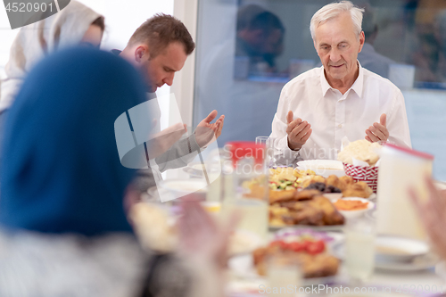 Image of modern muslim family having a Ramadan feast