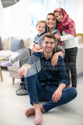 Image of portrait of young happy modern muslim family