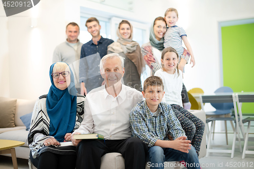 Image of portrait of happy modern muslim family