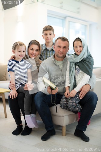 Image of portrait of young happy modern muslim family