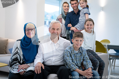 Image of portrait of happy modern muslim family