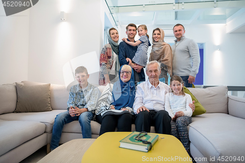 Image of portrait of happy modern muslim family