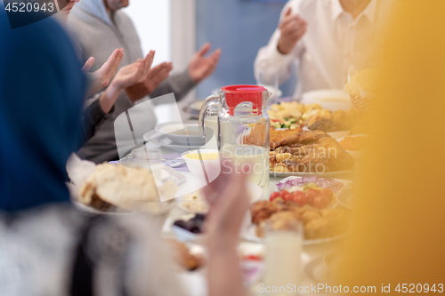 Image of modern muslim family having a Ramadan feast