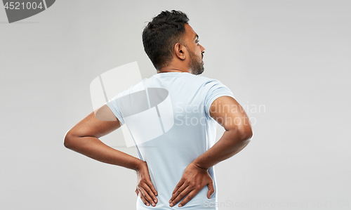 Image of indian man suffering from backache