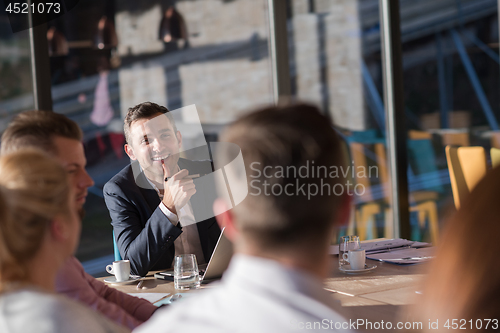 Image of Business Team At A Meeting at modern office building