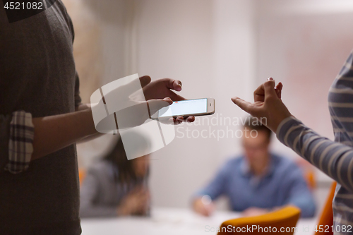 Image of Business Team At A Meeting at modern office building