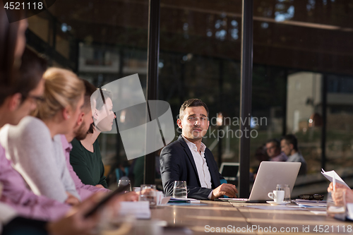 Image of Business Team At A Meeting at modern office building