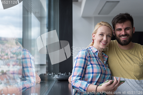 Image of Business People Working With Tablet in startup office