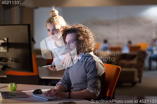 Image of young designers in the night office