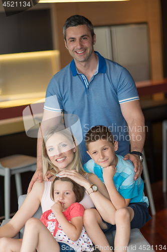 Image of couple spending time with kids