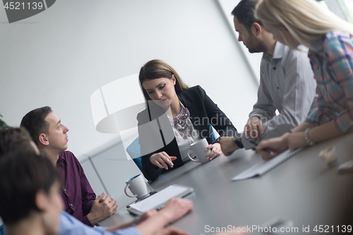 Image of Group of young people meeting in startup office