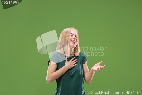 Image of happy woman. image of female model on green