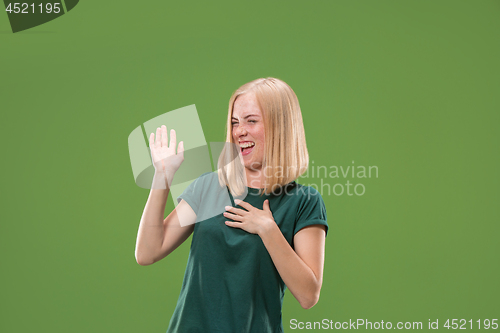 Image of happy woman. image of female model on green