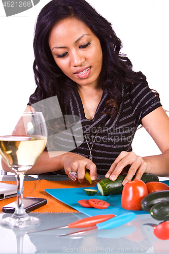 Image of Beautiful Girl Cooking in the Kitchen