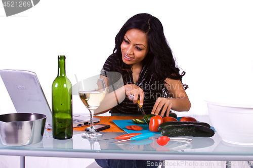 Image of Beautiful Girl Cooking in the Kitchen