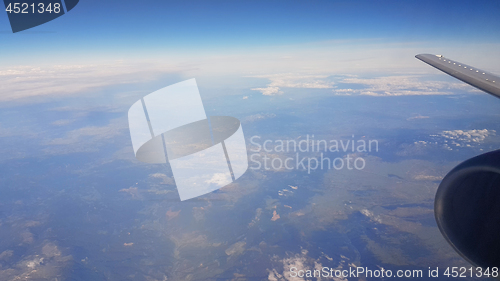 Image of Sky and jet plane wing