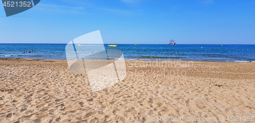 Image of Foot print on the sand and the sea