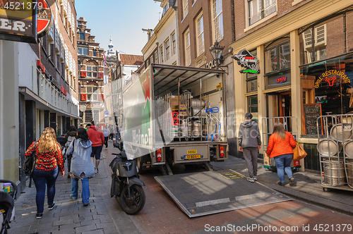 Image of People at streets of Amsterdam during spring time