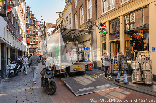 Image of People at streets of Amsterdam during spring time