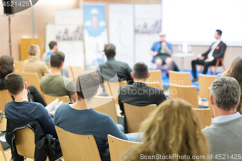 Image of Round table discussion at business and entrepreneurship convention.