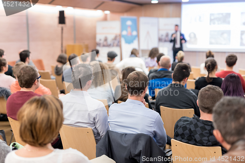 Image of Business speaker giving a talk at business conference event.