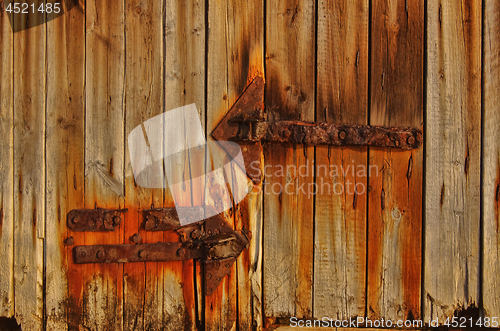 Image of Texture of the old gate with iron rusty details