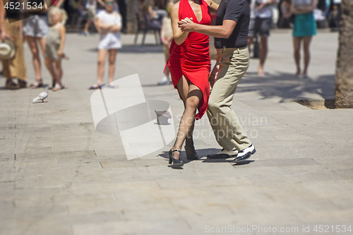 Image of Street couple dancers performing Argentine tango dance