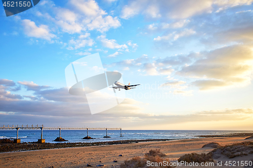 Image of Airplain landed at sanset