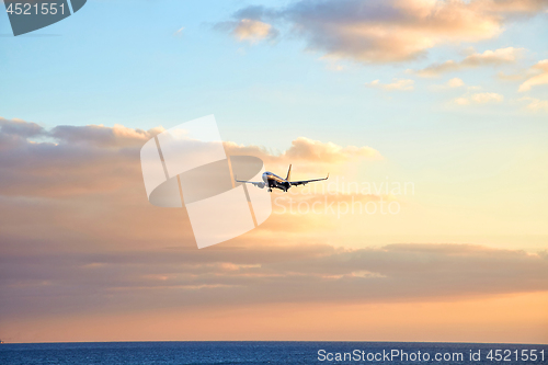 Image of Airplain landed at sanset