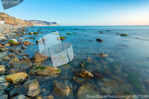 Image of Stony sea beach of the 40th anniversary of the victory of the high coast of Anapa at sunset, Black Sea, Anapa, Russia