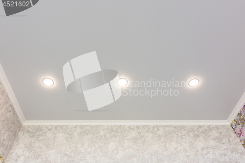 Image of Three spotlights built into the suspended ceiling