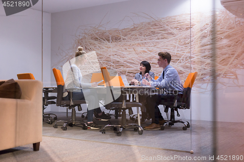 Image of Business Team At A Meeting at modern office building