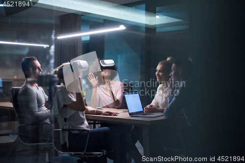 Image of Multiethnic Business team using virtual reality headset