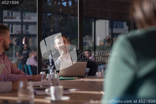 Image of Business Team At A Meeting at modern office building