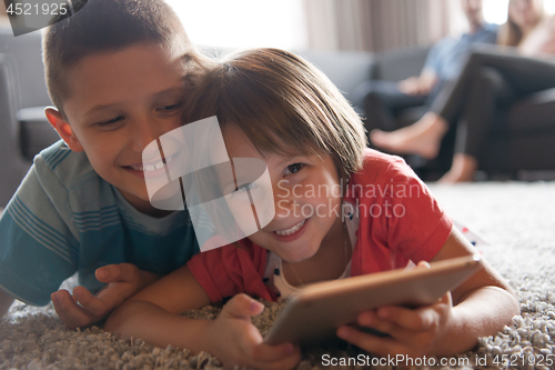 Image of couple spending time with kids