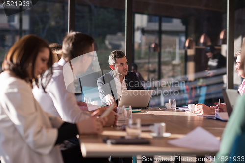 Image of Business Team At A Meeting at modern office building