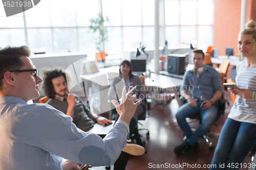 Image of Young Business Team At A Meeting at modern office building