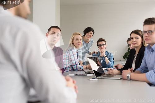 Image of Business Team At A Meeting at modern office building