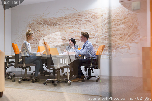 Image of Business Team At A Meeting at modern office building