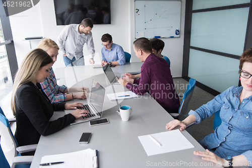 Image of Group of young people meeting in startup office