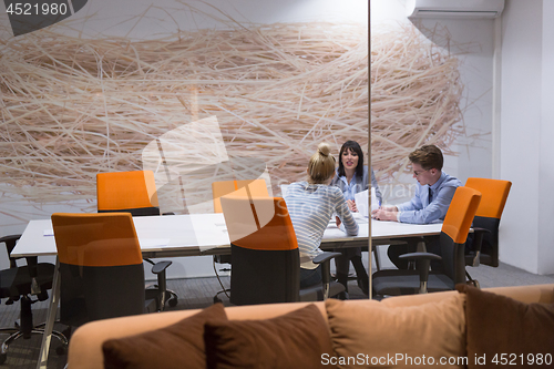 Image of Business Team At A Meeting at modern office building