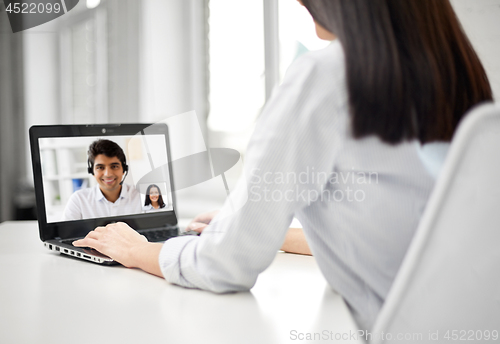 Image of businesswoman having video call on laptop