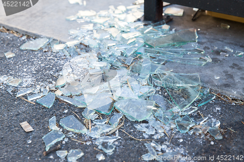 Image of shards of broken glass on floor