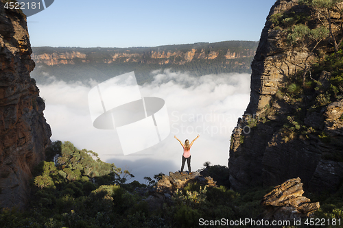 Image of Woman feelings of exhilaration hiking in Blue Mountains Australia