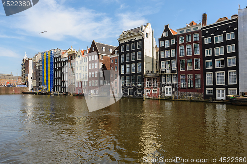 Image of Dancing Canal Houses of Damrak, Amsterdam, Netherlands