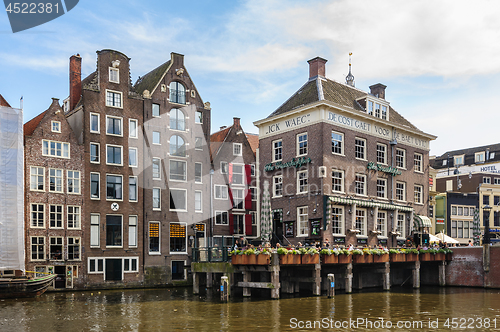 Image of Dancing Canal Houses of Damrak, Amsterdam, Netherlands